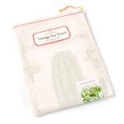 Cacti and Succulents Vintage Cotton Tea Towel by Cavallini and Co. Pictured packaged in a keepsake muslin bag
