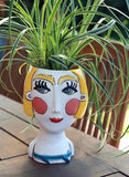 Darcell Abstract Lady Planter by Allen Designs. Pictured with a Spider Plant