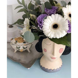 Rose Planter by Allen Designs. Pictured displayed with a bouquet of flowers