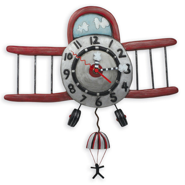 Airplane jumper pendulum clock by Allen Designs. Complete with fully functional parachute pendulum