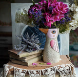 White bird vase or watering can by Allen Designs. Pictured with assorted beautiful flowers and lavender